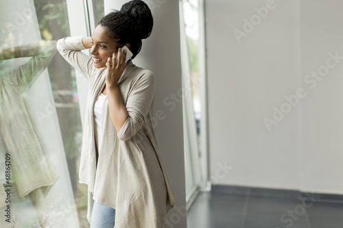 Pretty young woman in the o...
