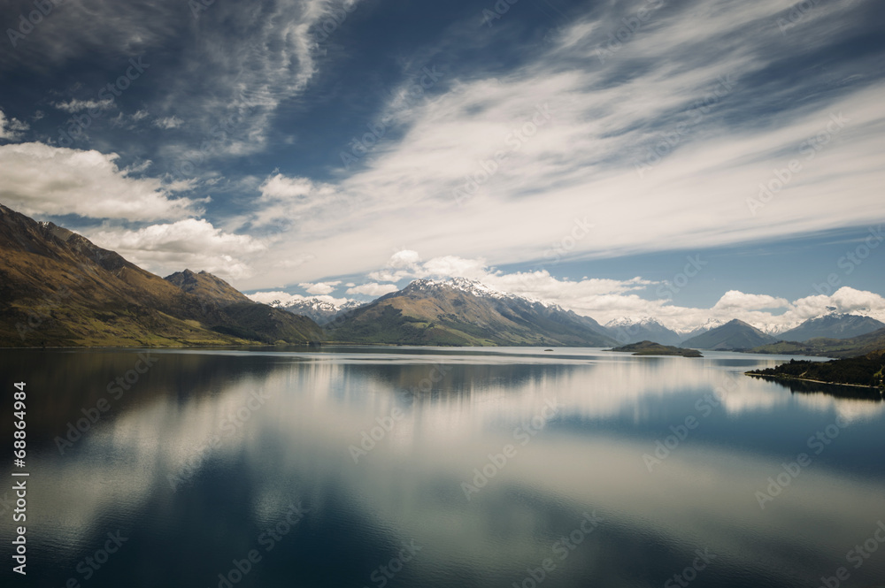 Reflection of the mountain range on Lake Wakatipu, New Zealand