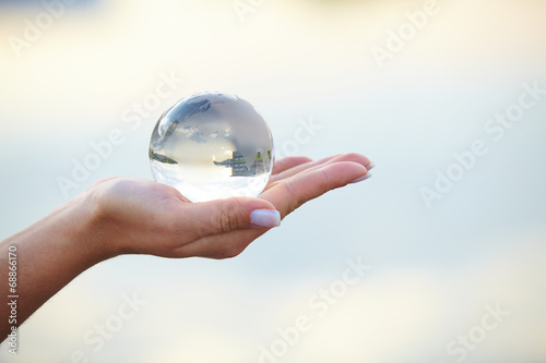 Crystal ball on hand