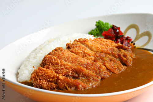 Japanese food fry pork tongkatsu curry with wood pattern 
