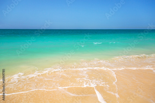 Beach with turquoise water background