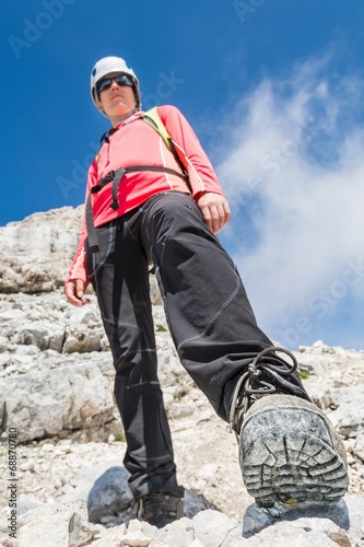 Portrait of a female climber shot from underneath