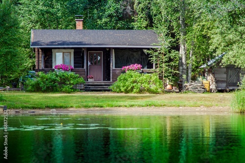 Old Finnish summer cottage at a lake