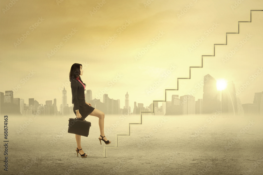 Businesswoman step on stair for success