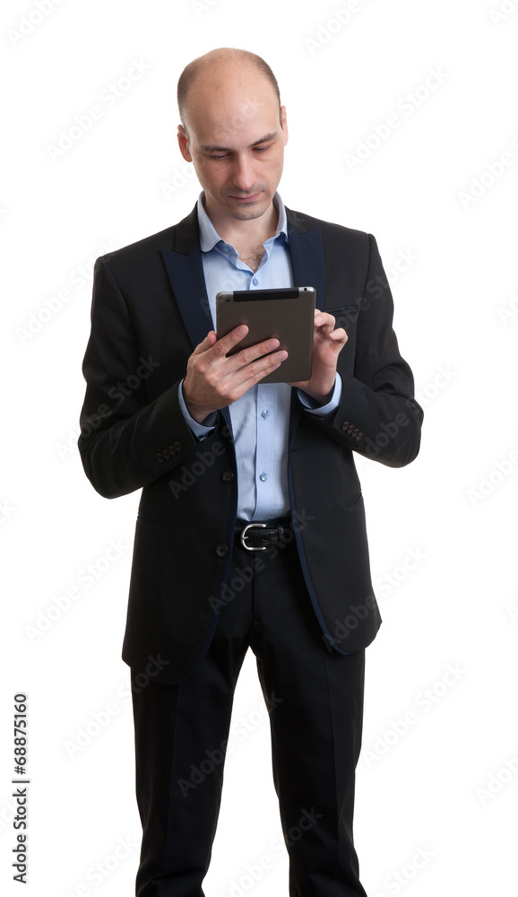 Businessman using his tablet computer Businessman using his tablet computer