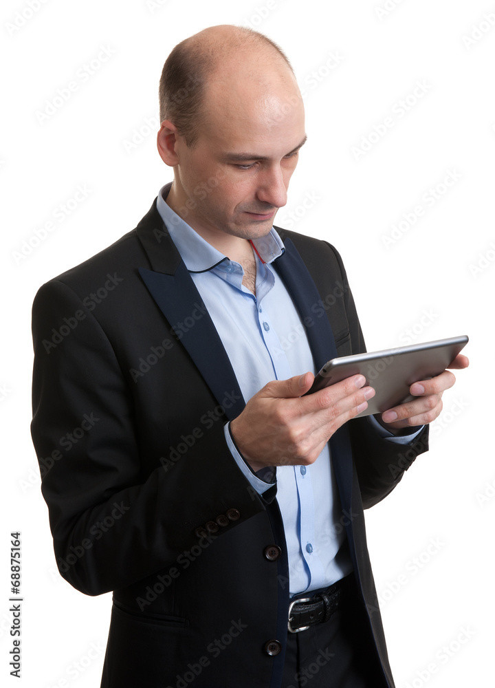 Businessman using his tablet computer