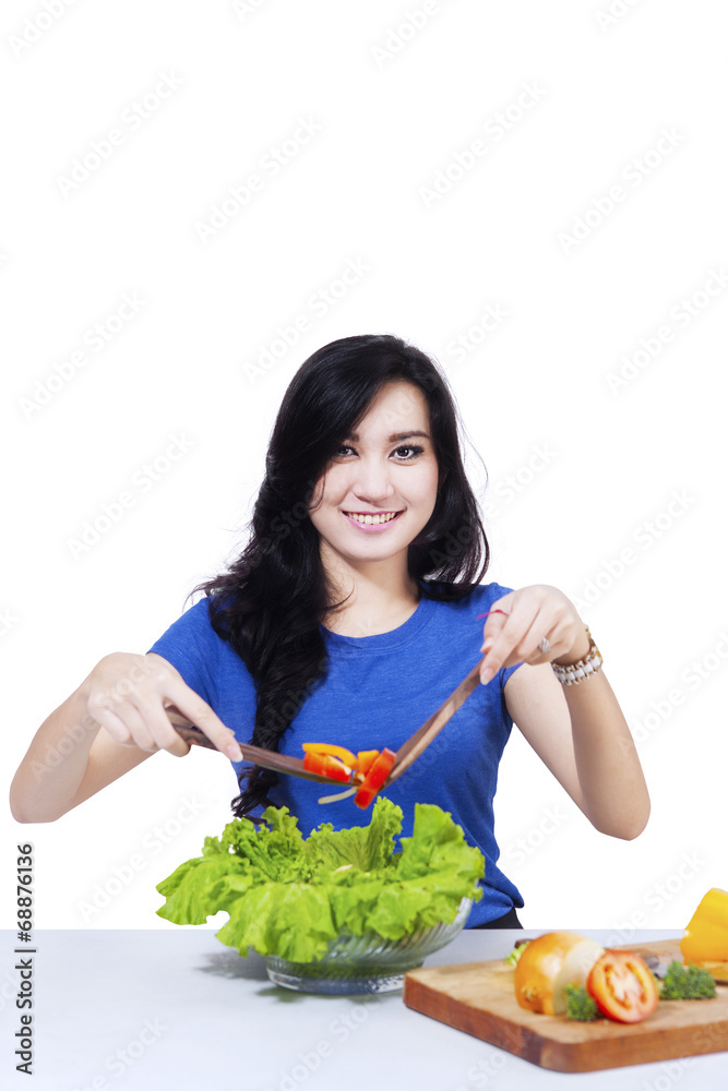 Pretty woman prepare salad 1