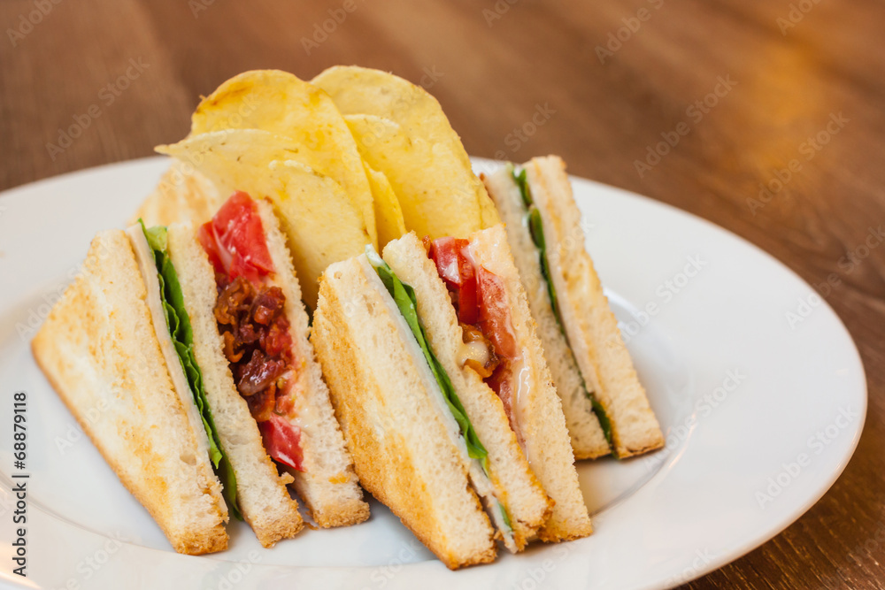 club sandwich with bacon and egg