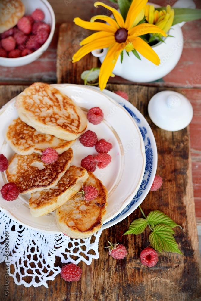 Fat pancakes with fresh raspberries Fat pancakes with fresh raspberries