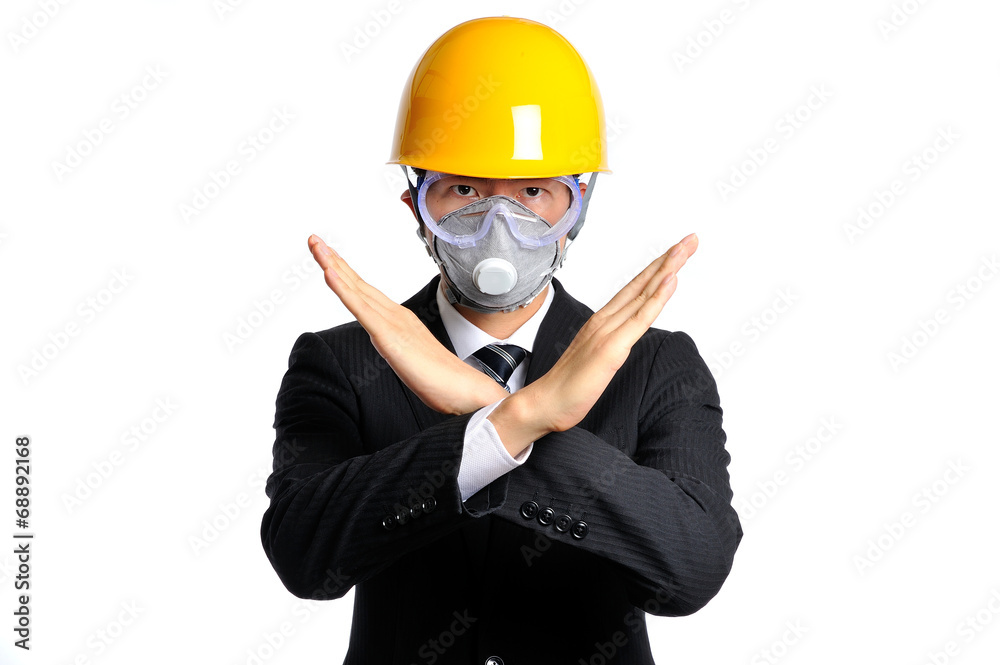 防護マスクとヘルメットを被っているスーツの男性 防護マスクとヘルメットを被っているスーツの男性