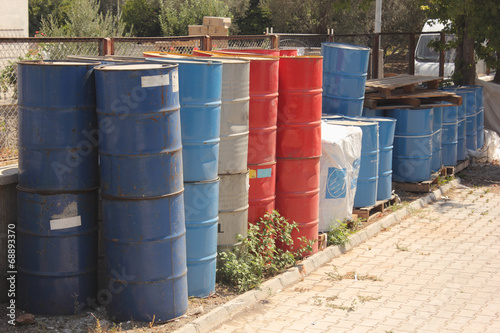 collection of old toxic 50 gallon drums