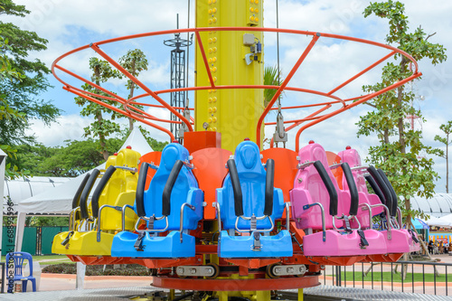 Seats of free fall tower in amusement park