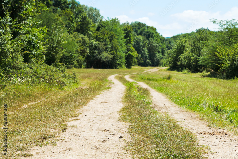 Fototapeta premium country road in low caucasus mountains
