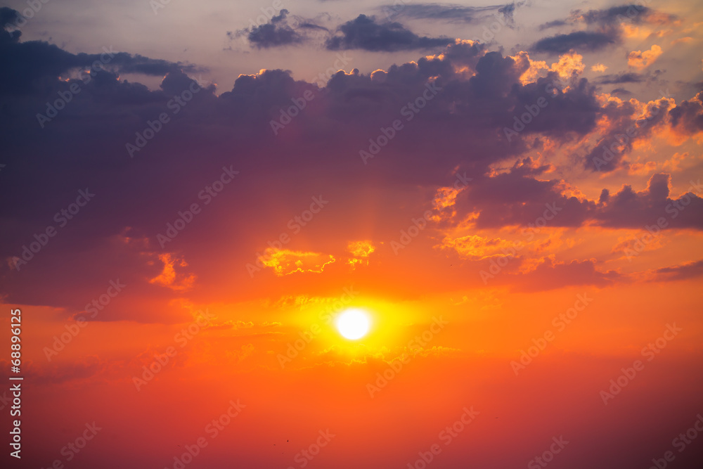 Fototapeta premium Beautiful cloudscape and sun, sunrise shot