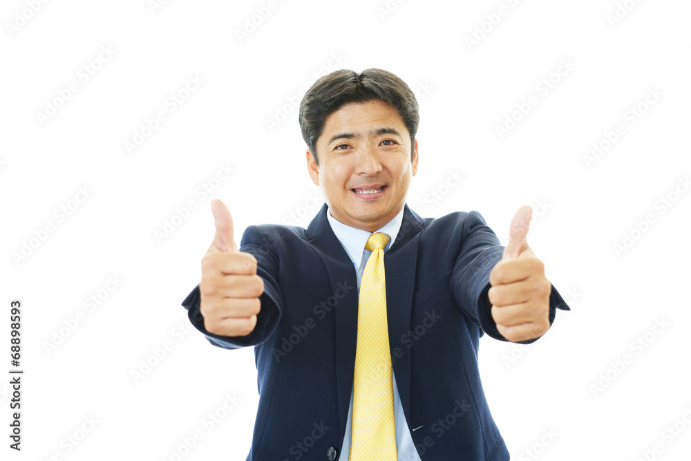 ガッツポーズのビジネスマン