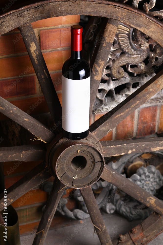 Red wine on wooden wheel