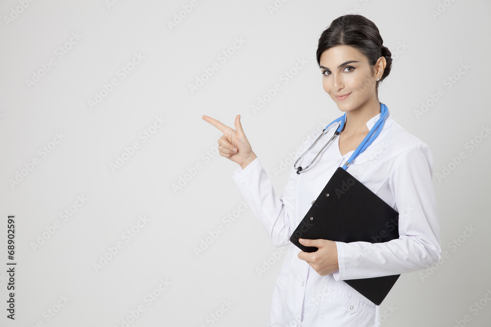 Smiling medical doctor woman with stethoscope. Smiling medical doctor woman with stethoscope.