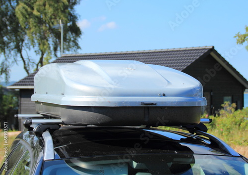 Frontend of roof box on car photo