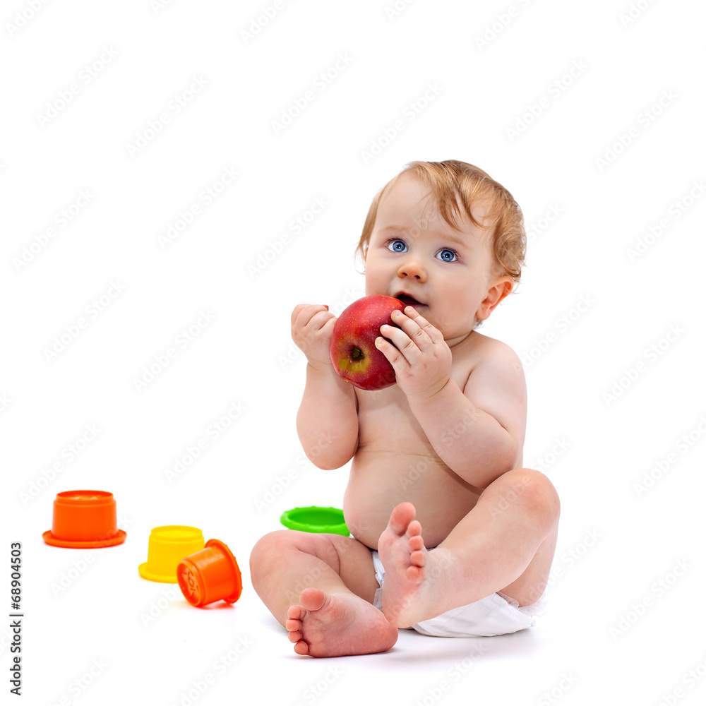 Cute infant boy with apple