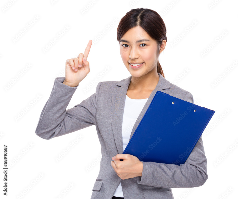 Businesswoman with clipboard and finger point up Businesswoman with clipboard and finger point up