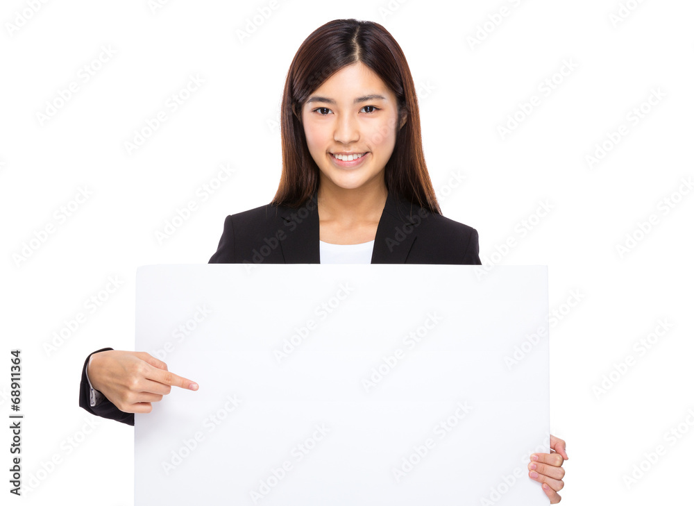 Asian businesswoman finger point to blank placard Asian businesswoman finger point to blank placard