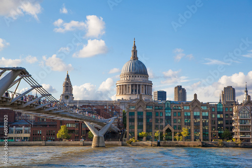 South bank walk of the river Thames. St. Paul's cathedral.  photo