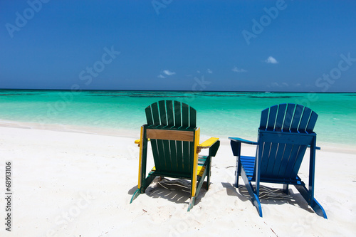 Colorful lounge chairs at Caribbean beach