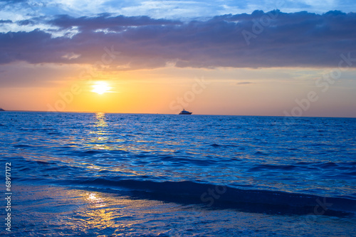 Stunning beautiful sunset on an exotic caribbean beach