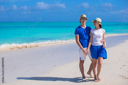Happy couple have fun during Caribbean beach vacation