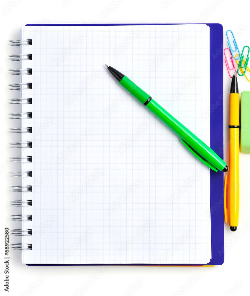 Notebook with color pens on a white background Notebook with color pens on a white background