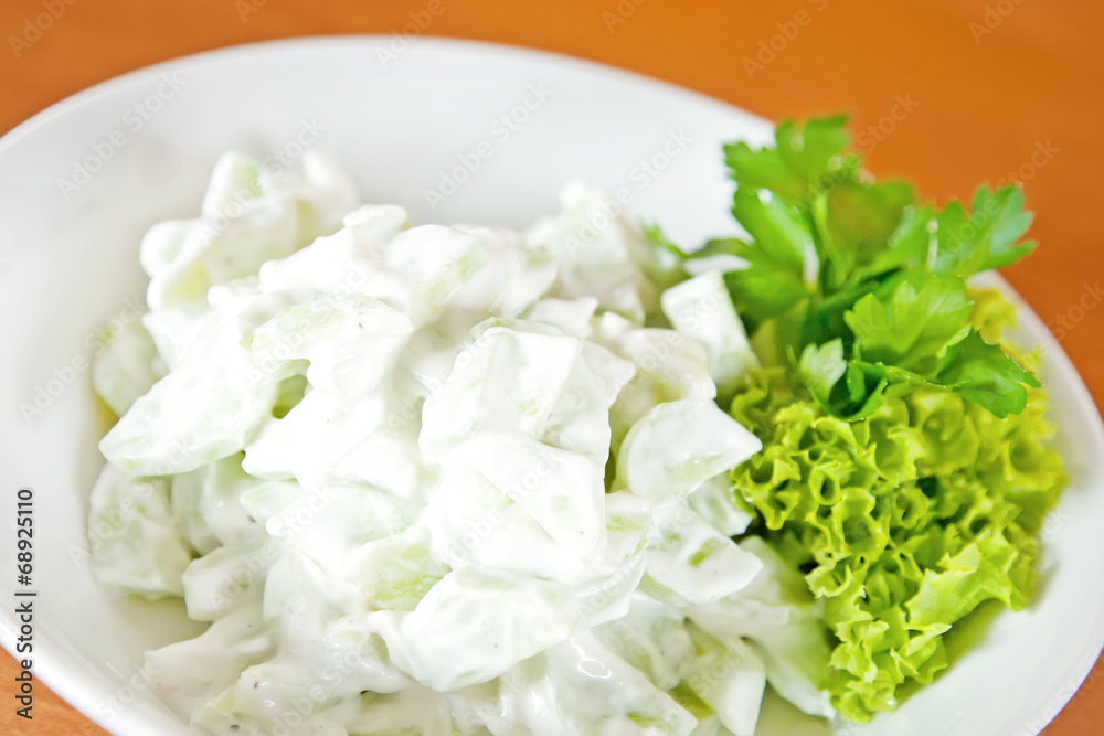 Salad with cucumber and garlic sour cream sauce Salad with cucumber and garlic sour cream sauce