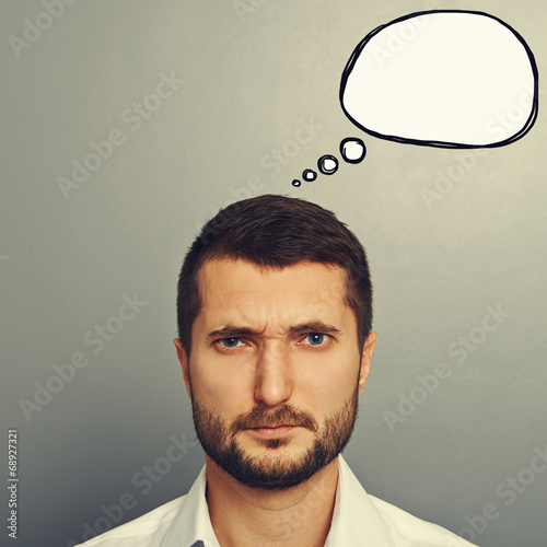 frowning man with speech bubble