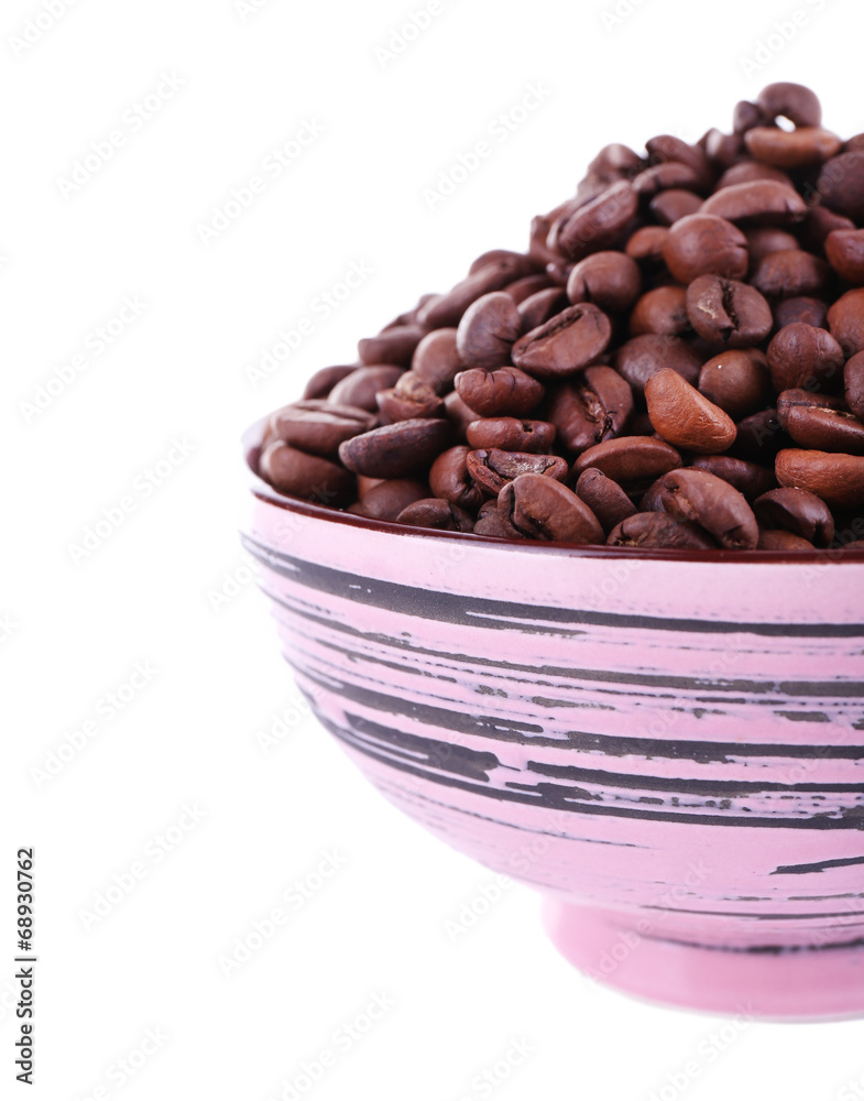 Coffee beans in big lilac bowl isolated on white Coffee beans in big lilac bowl isolated on white