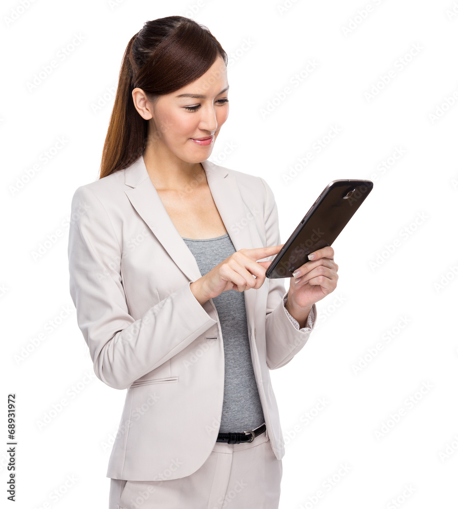 Businesswoman touch on digital tablet Businesswoman touch on digital tablet