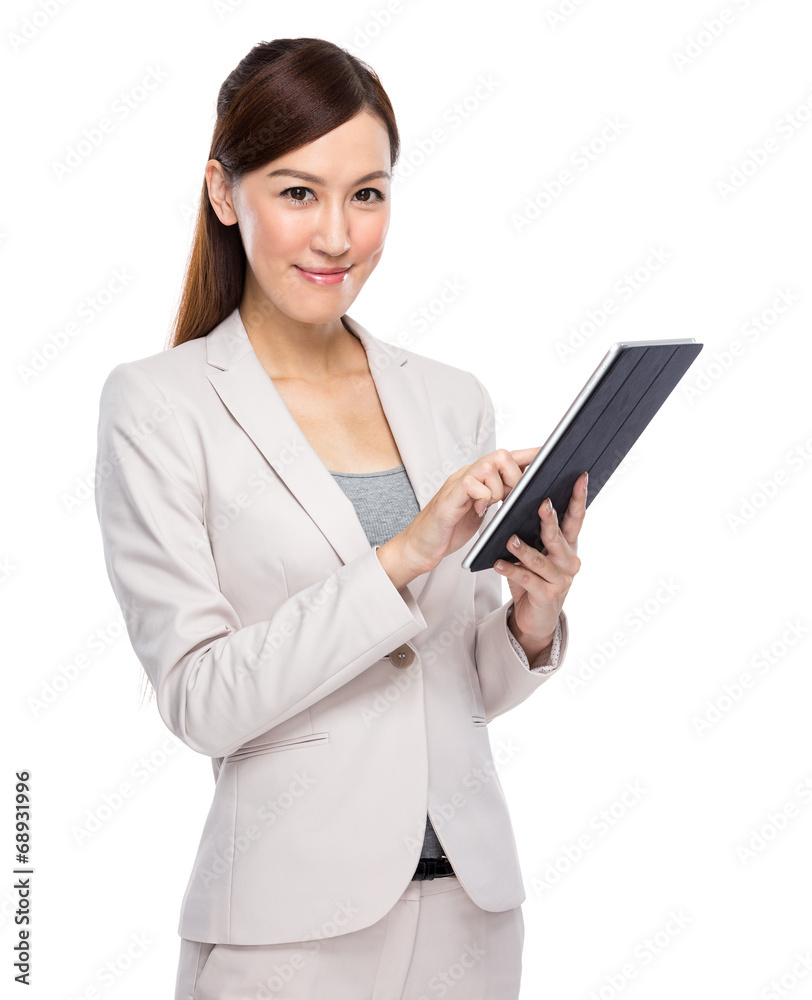 Asian businesswoman touch on digital tablet Asian businesswoman touch on digital tablet