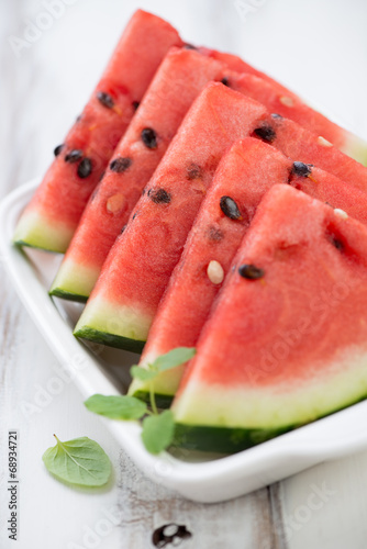 Close-up of sliced watermelon, vertical shot