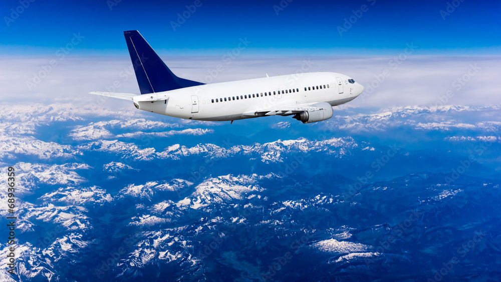 Fototapeta premium Landscape of Mountain. Airplane in the sky