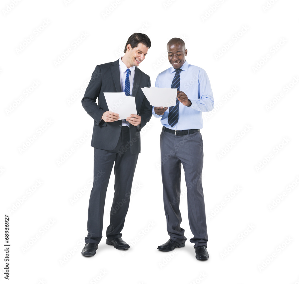 Business Colleagues Discussing about the Documents Business Colleagues Discussing about the Documents