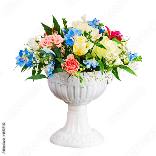 Bouquet from flowers in vase isolated on white background.