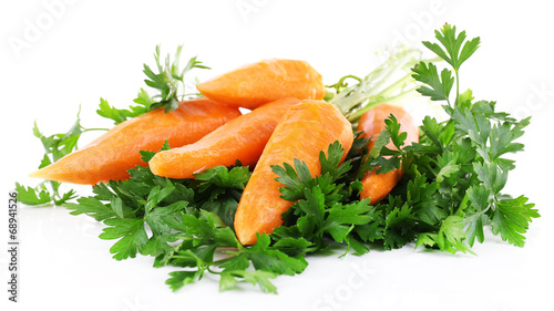 Carrots and parsley isolated on white