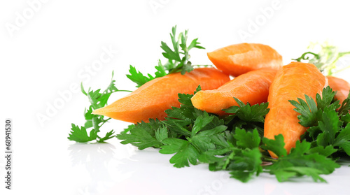 Carrots and parsley isolated on white