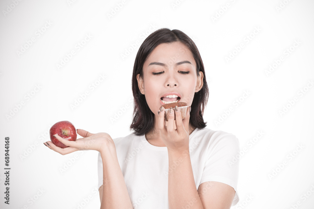 Smiling woman with apple isolated on white Smiling woman with apple isolated on white