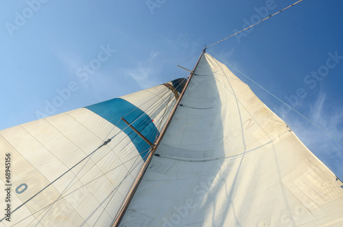 Old boat standing and running rigging - mainsail,staysaill,mast photo