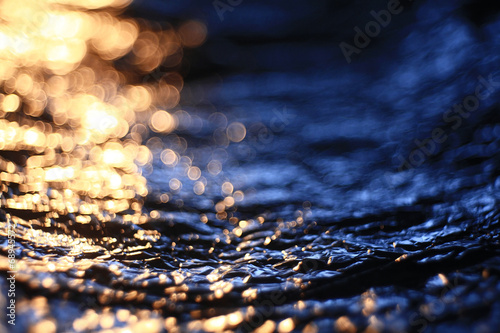 abstract texture, simulation of water at sunset