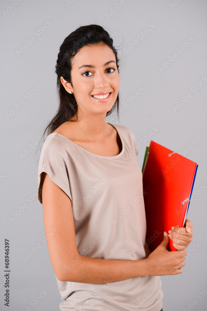 portrait of cheerful young brunette student at university portrait of cheerful young brunette student at university