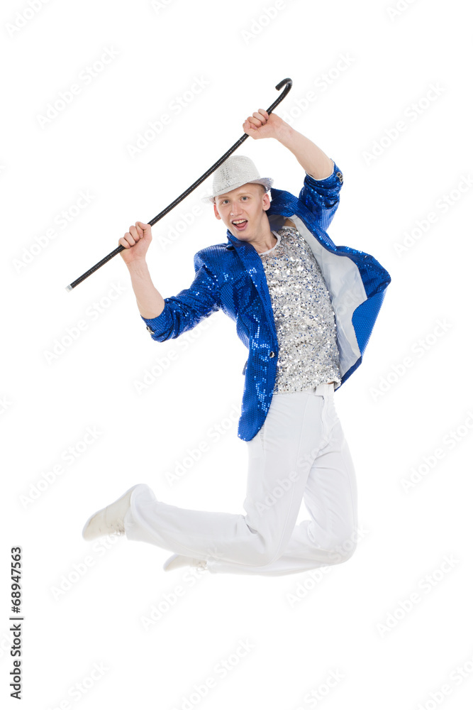 Man dancer in the blue sparkle suit and white trousers jumping Man dancer in the blue sparkle suit and white trousers jumping