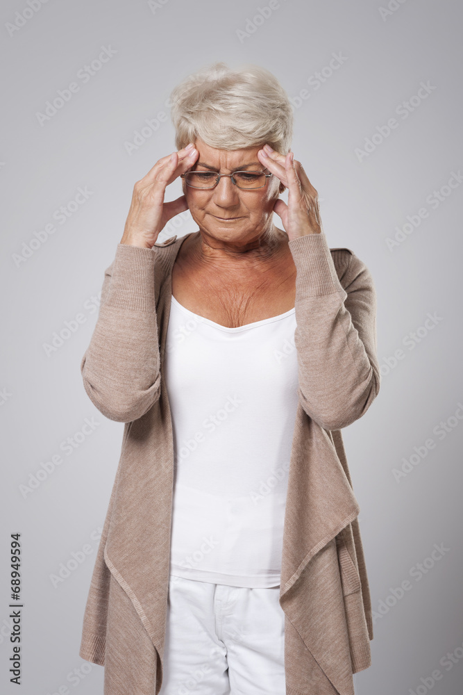 Senior woman with huge pain of head Senior woman with huge pain of head