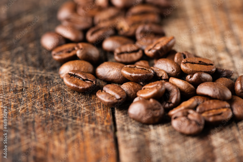 Coffee on grunge wooden background close up Coffee on grunge wooden background close up