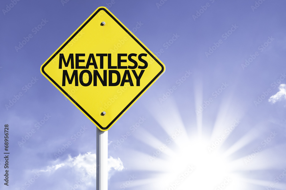 Meatless Monday road sign with sun background Meatless Monday road sign with sun background