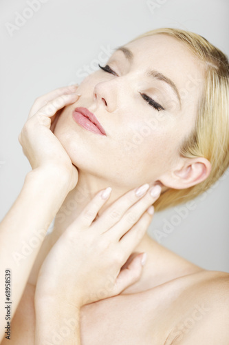Attractive woman in beauty pose